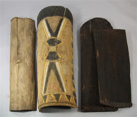 Two Sepik River tree bark shields, hardwood shield & board